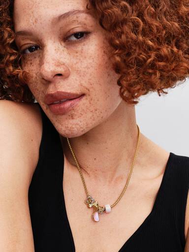 Charm Estrella Cruzada Brillante Talla única