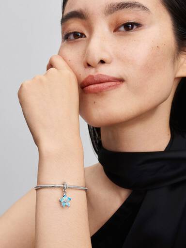 Charm colgante flor azul