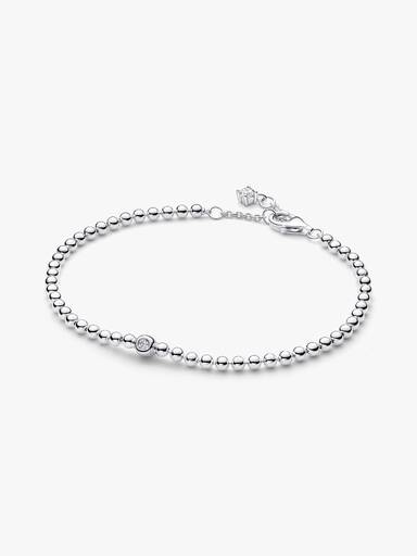 Brazalete de cuentas y piedras brillantes