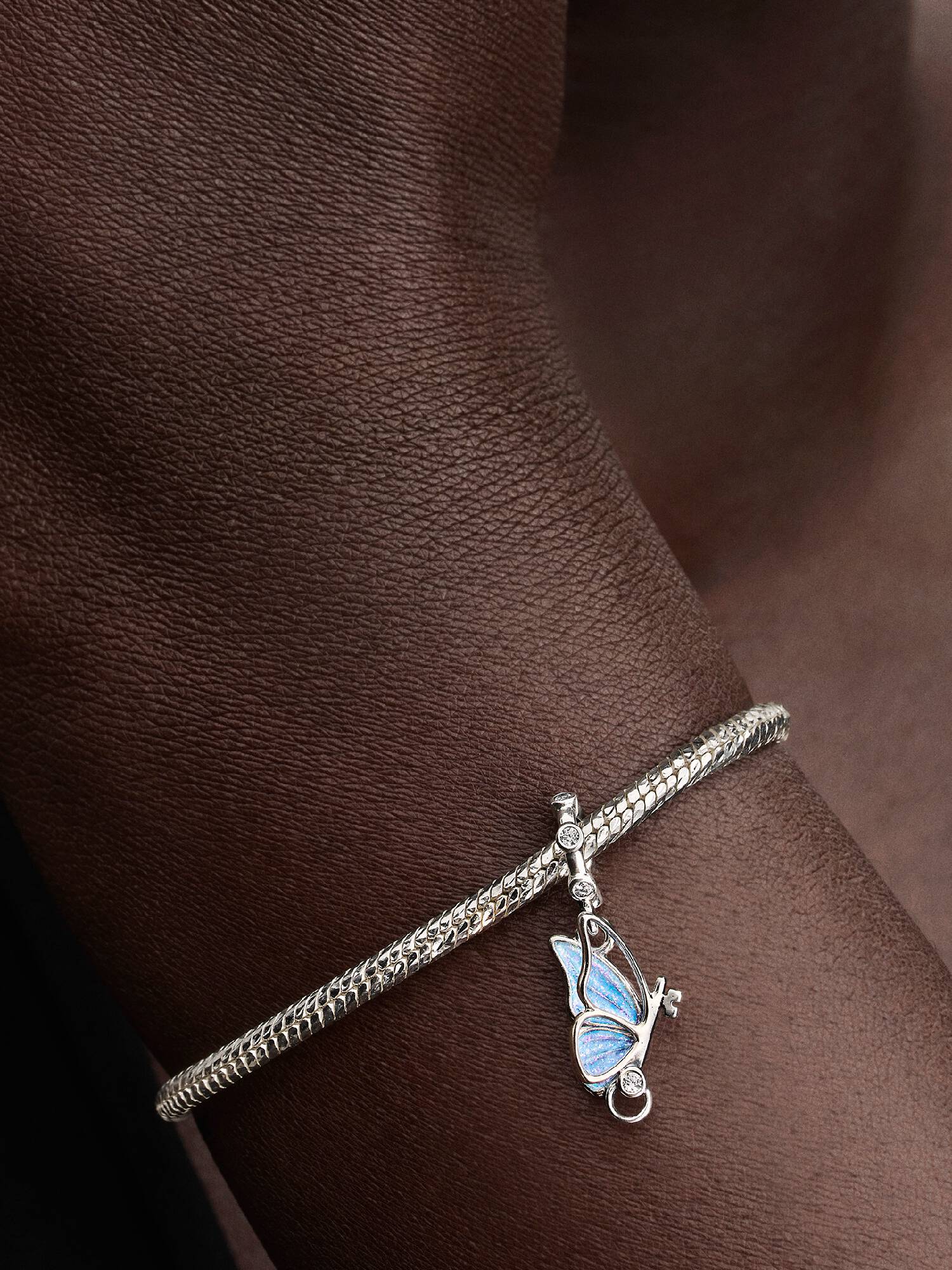 Charm colgante con alas